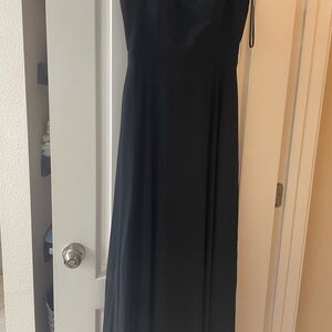 Black formal dress size medium fits like a size 8. New with tag.
